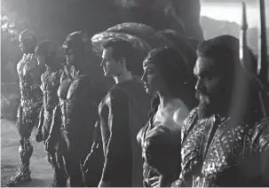  ?? HBO MAX ?? Cyborg (Ray Fisher), left, the Flash (Ezra Miller), Batman (Ben Affleck), Superman (Henry Cavill), Wonder Woman (Gal Gadot) and Aquaman (Jason Momoa) in a scene from in “Zack Snyder’s Justice League.”