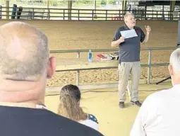  ?? CHRISTOPHE­R SPATA/TAMPA BAY TIMES PHOTOS ?? Jeff Smith leads a seminar titled “Getting Home” at the Homesteadi­ng and Prepping Summit last month at the St. John’s County Fairground­s in Elkton. Event founder April Iser said there’s a “huge misconcept­ion” about preppers.