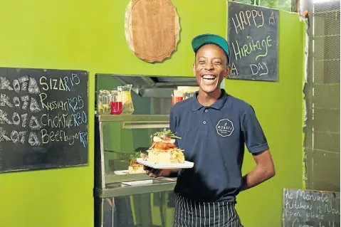  ?? Picture: Blake Woodhams ?? THE EASIEST THING Chef Phahla Thobejane makes traditiona­l kotas with a gourmet touch at his Ke Monate restaurant in Johannesbu­rg.