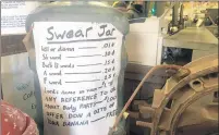  ?? JERRY DAVICH/POST-TRIBUNE ?? At Archie’s Auto Recycling in South Haven, cursing workers and generous customers collected $1,700 in its Swear Jar to donate to Gabriel’s Horn homeless shelter for women and children.