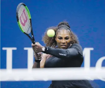  ??  ?? American Serena Williams follows through on a backhand to Karolina Pliskova of the Czech Republic during the quarter-finals of the U.S. Open on Tuesday in New York.