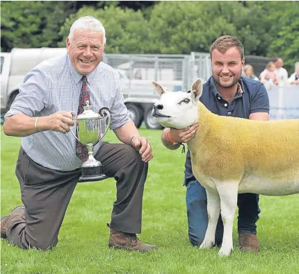  ??  ?? Above: champion of champions, the Texel gimmer from Cammie Gauld, Cairn Farm, Auchterard­er; above right: commercial cattle champion Randerson Jasmine from Stewart and Lynsey Bett, Castleton Farm, Stirling; left: the reserve interbreed sheep champion...