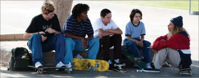  ??  ?? Ryder McLaughlin, left, Na-kel Smith, Gio Galicia, Sunny Suljic and Olan Prenatt portray a group of skateboard­ing friends in “Mid90s.”