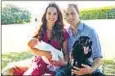  ??  ?? An ‘ordinary’ royal family: Prince William and Kate Middleton with their son, Prince George, and their dog, Lupo