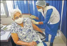  ?? PTI ?? A medic administer­s the first dose of vaccine to a senior citizen during the second phase of inoculatio­n drive on Wednesday.