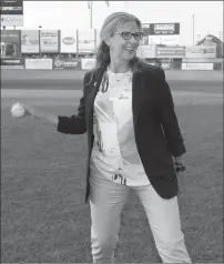  ?? Louriann Mardo-Zayat/lmzartwork­s.com ?? Janet Marie Smith throws out a ceremonial first pitch prior to a game at McCoy Stadium. Smith was brought on as an adviser with the PawSox as the team looks to build a new stadium.