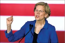  ??  ?? Democratic presidenti­al candidate Sen. Elizabeth Warren, D-Mass., speaks to supporters at a primary election night rally in Nashua, N.H., on Feb. 11.