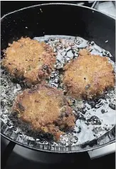  ??  ?? Breaded crab cakes, pan-fried until crispy.