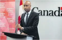  ?? MICHAEL TUTTON / THE CANADIAN PRESS FILES ?? Immigratio­n Minister Ahmed Hussen announced cuts after an audit last year revealed low uptake on the funds.