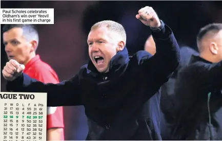  ??  ?? Paul Scholes celebrates Oldham’s win over Yeovil in his first game in charge