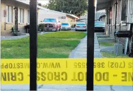  ?? Mike Shoro ?? Las Vegas Review-journal An apartment complex at 825 W. Lake Mead Blvd. was taped off Tuesday as police investigat­ed a shooting that left one man dead.