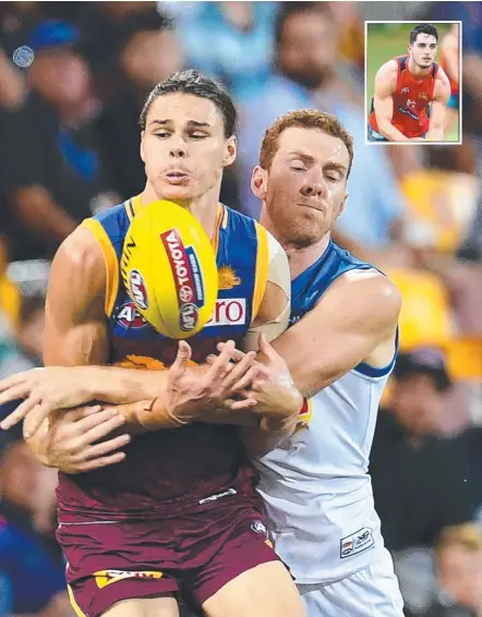  ??  ?? Suns defender Rory Thompson tackles the Lions’ Eric Hipwood in Gold Coast’s hard-fought win and (inset) Brayden Fiorini.