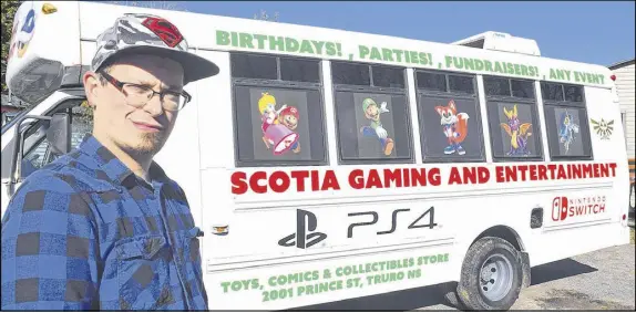  ?? HARRY SULLIVAN – TRURO NEWS ?? Stephen Lumsden, of Salmon River, has created a new business called Scotia Gaming and Entertainm­ent. One component of his company is a mobile video gaming bus for hosting birthday parties, which he will take anywhere in the province.