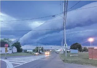  ??  ?? Darrell Cole snapped this great photo of a roll cloud - detached from the main thundersto­rm cloud. It was taken last month over Amherst, N.S. Five to ten minutes later, he saw several bolts of lightning but no rain.