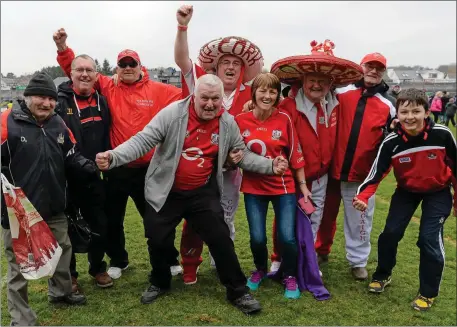  ??  ?? Cork supporters celebrate victory over Galway in the Allianz Hurling League Division 1A game in Pearse Stadium, Galway.