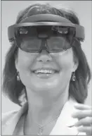  ?? The Canadian Press ?? BC Liberal Leader Christy Clark wears a Microsoft HoloLens during a campaign stop at Finger Food Studios in Port Coquitlam, on Wednesday.