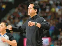  ?? DAVID ZALUBOWSKI/AP ?? Heat coach Erik Spoelstra gestures during the second half against the Nuggets on Thursday in Denver.