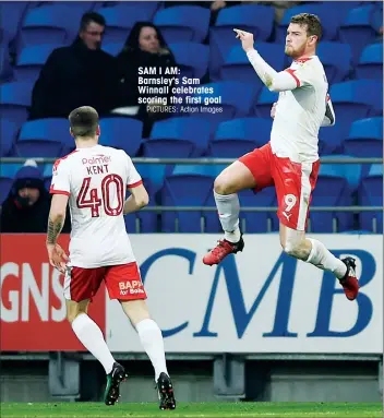  ?? PICTURES: Action Images ?? SAM I AM: Barnsley's Sam Winnall celebrates scoring the first goal
