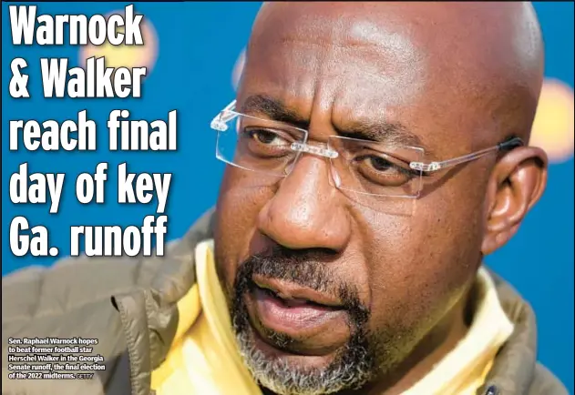  ?? GETTY ?? Sen. Raphael Warnock hopes to beat former football star Herschel Walker in the Georgia Senate runoff, the final election of the 2022 midterms.