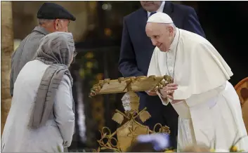  ?? RICCARDO DE LUCA — THE ASSOCIATED PRESS ?? Pope Francis attends a meeting of listening and prayer inside the Basilica of Santa Maria degli Angeli in Assisi, central Italy, on Friday.