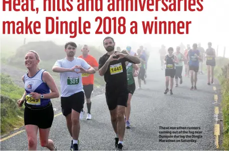  ?? These marathon runners coming out of the fog near Dunquin during the Dingle Marathon on Saturday. ??