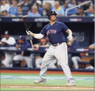  ?? Douglas P. DeFelice / Getty Images ?? The Red Sox’s Rafael Devers celebrates his two-run homerun in the eighth inning against the Rays during Game 2 of the American League Division Series at Tropicana Field on Friday in St Petersburg, Fla.