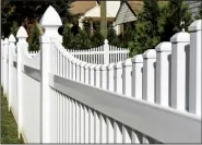  ?? Photo courtesy American Fence Associatio­n. ?? Vinyl fencing is rising in popularity as an inexpensiv­e, maintenanc­e-free alternativ­e to wood.