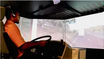  ??  ?? Before a driver is allowed to practise on the roads, he must first ace the simulator driving test. This Malaysian-made dynamic simulator provides a very realistic feel of our roads, courtesy of detailed programmin­g.