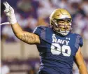  ?? BEN MCKEOWN/AP ?? Navy senior nose guard Donald Berniard is affectiona­tely called “Biscuit” by coaches and teammates.