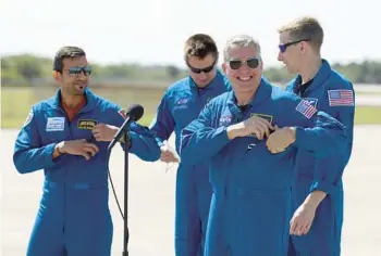  ?? JOE RAEDLE/GETTY ?? Sultan Al Neyadi ,of the United Arab Emirates, Russian cosmonaut Andrey Fedyaev, and NASA astronauts, Mission Commander Stephen Bowen and Pilot Warren Hoburg, arrive at the Kennedy Space Center on Feb. 21 in Cape Canaveral. The SpaceX Crew-6 is scheduled to launch at 1:45 a.m. Monday from Launch Complex 39A.