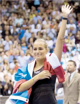  ??  ?? Puig cerró el año con un triunfo ante su gente en partido amistoso en el Coliseo de Puerto Rico ante la rusa María Sharapova.