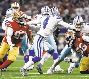  ?? ROGER STEINMAN AP ?? 49ers defensive tackle D.J. Jones (93) sacks Cowboys quarterbac­k Dak Prescott in the second half.