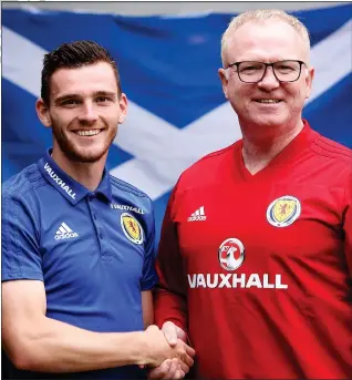  ??  ?? Andy Robertson has been handed the armband by manager Alex McLeish