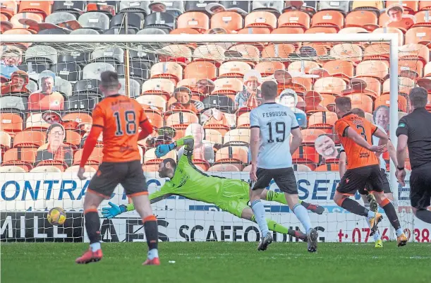  ??  ?? DECIDER: Adrian Sporle scores the only goal of the game, above. Right: United players stand rather than taking the knee. Below: Marc Mcnulty chases Aberdeen’s Ross Mccrorie.