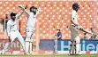  ??  ?? India's wicketkeep­er and manof-the-match Rishabh Pant (C) and teammate Rohit Sharma successful­ly appeal against the wicket of England's captain Joe Root (R) - AFP