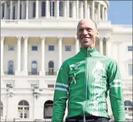  ?? Contribute­d photo ?? Monte Frank stands outside the U.S. Capitol in Washington, D.C., after a bicycle trip from Newtown to Washington to advocate for meaningful gun violence prevention legislatio­n.