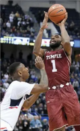  ?? FRED BECKHAM — THE ASSOCIATED PRESS ?? Temple’s Josh Brown, 1, goes up for the game-winning shot as Connecticu­t’s Sterling Gibbs defends in Hartford, Conn., on Tuesday. TV/Radio: FS1⁄610 AM Records: Seton Hall (12-2 overall, 2-0 Big East), Villanova (12-2, 2-0). Series: Villanova leads,...