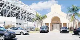  ?? KAYLA O’BRIEN/STAFF ?? The Faith Deliveranc­e Temple, next to the Orlando City Stadium,hopes to capitalize on soccer by leasing spaces in its parking lot on game days.