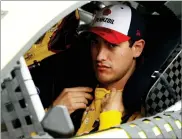  ??  ?? AP PHOTO BY MATT SLOCUM Joey Logano sits in his car before qualifying for the NASCAR Cup Series auto race, Sunday, in Watkins Glen, N.Y.