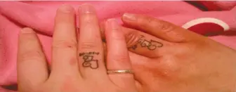  ??  ?? Engagement tattoos are common in Western culture