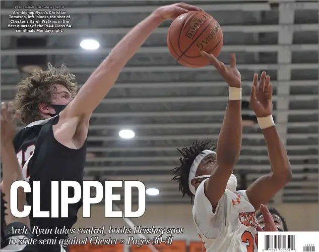  ?? PETE BANNAN — MEDIANEWS GROUP ?? Archbishop Ryan’s Christian Tomasco, left, blocks the shot of Chester’s Karell Watkins in the first quarter of the PIAA Class 5A
semifinals Monday night.