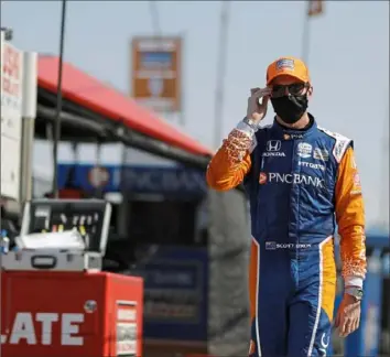  ?? Associated Press ?? Scott Dixon: Alone in the garage area at Indianapol­is and atop the IndyCar standings.