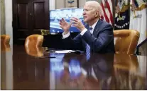  ?? ANDREW HARNIK — THE ASSOCIATED PRESS ?? President Joe Biden is enjoying support across party lines for his handling of the pandemic, according to a new poll