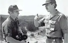  ??  ?? Donovan (right) was a mentor to many military public affairs specialist­s and set the state’s standards for the response to war and casualties.