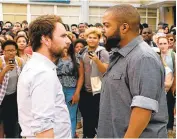  ?? WARNER BROS. ?? There is no love lost between Charlie Day’s and Ice Cube’s surly, immature characters in “Fist Fight.”