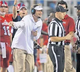  ?? JIM RASSOL/STAFF FILE PHOTO ?? Lane Kiffin is enjoying the success that is present. this year’s FAU team and wants to stay in the