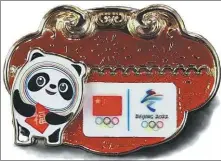  ?? XINHUA ?? The China pin features Bing Dwen Dwen, the panda mascot of the Beijing 2022 Winter Olympics.