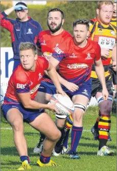  ?? Pictures: Paul Amos FM4551666; FM4551673, right ?? Aylesford look to get the ball out quickly and, right, try to stop Ashford