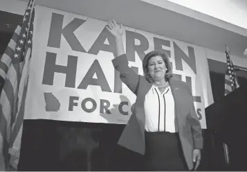  ?? JESSICA MCGOWAN, GETTY IMAGES ?? Republican candidate Karen Handel won Georgia’s 6th Congressio­nal District.