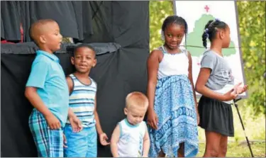  ?? MARIAN DENNIS – DIGITAL FIRST MEDIA ?? Kids showed off their singing skills Saturday during the Stop the Drugs Stop the Violence Crusade in Riverfront Park.